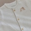 Beige kruippakje met leeuwtje - One piece suit vanilla melee